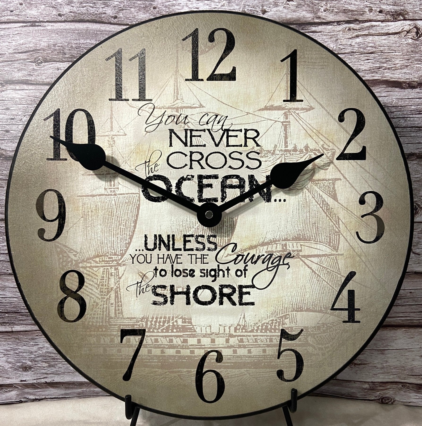 il_fullxfull.5720685766_kcbn.jpg Courage Nautical Wall Clock - Image 1