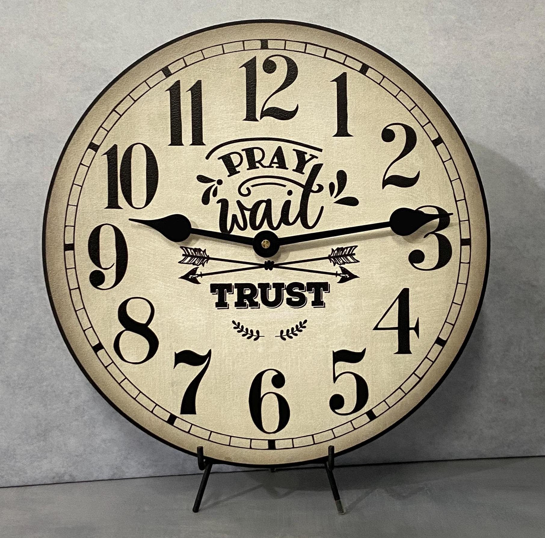 il_fullxfull.6159506974_8pb4.jpg Pray Wait Trust Wall Clock - Image 1
