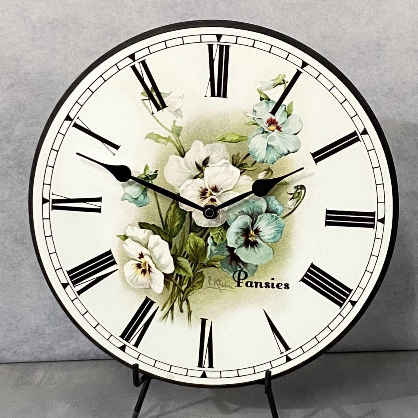 il_fullxfull.6283873258_r4ud.jpg White Pansies Wall Clock - Image 1