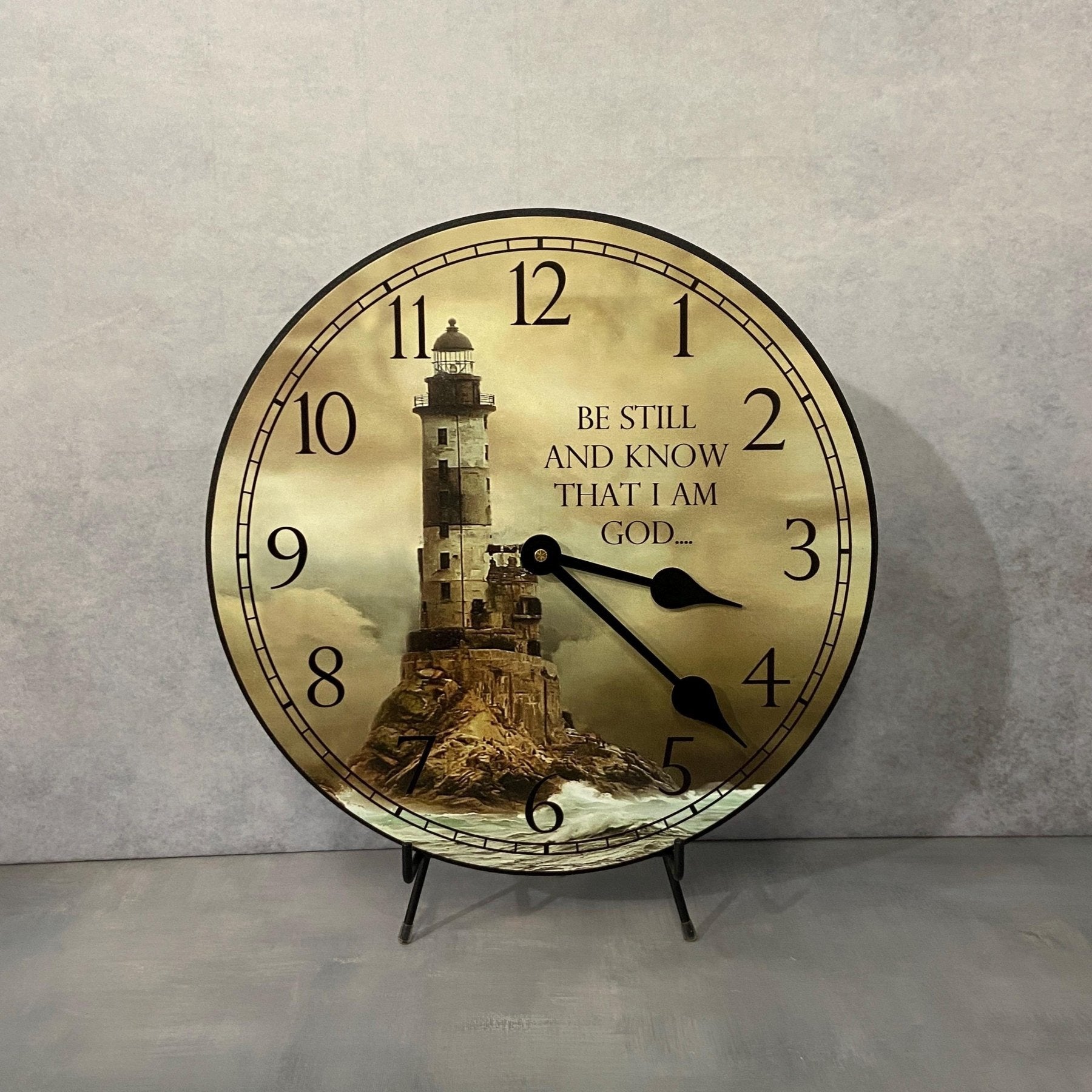 il_fullxfull.6414173874_qvcl.jpg Warm Pantina Lighthouse Wall Clock - Image 1